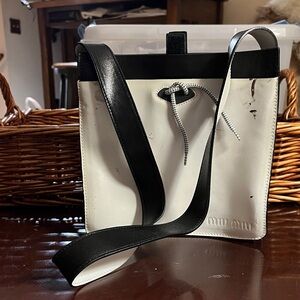 Miu Miu Black and White distressed Crossbody Bag